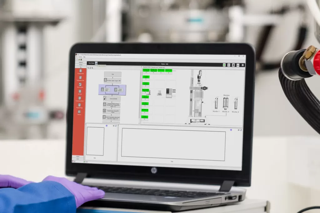 A chemist using Syrris Atlas' automation software